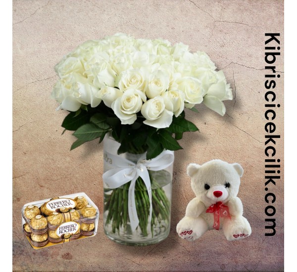 Vazoda 51 Beyaz Gül Ayıcık 16'lı Ferrero Çikolata Vazoda 51 Beyaz Gül Ayıcık 16'lı Ferrero Çikolata